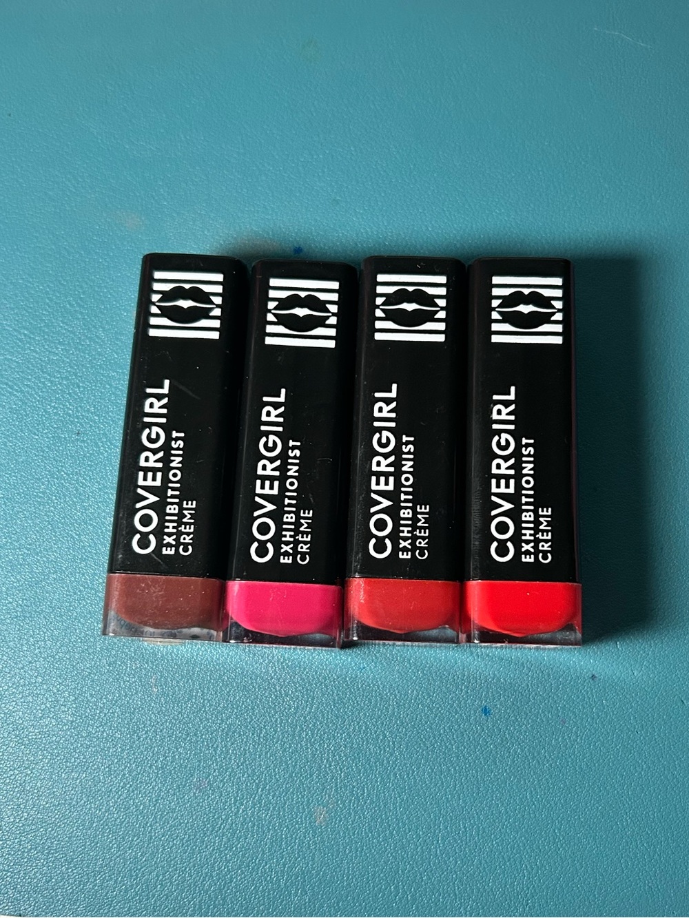 COVERGIRL Exhibitionist Crème Lipstick Set 4pc- Brown, Hot Pink, Red, Bright Red
